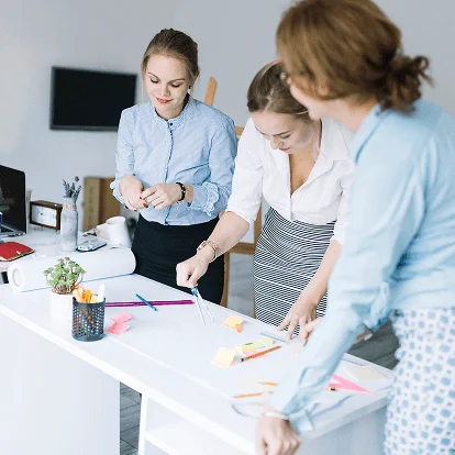 Creative-group-of-businesswoman-preparing-business-plan-in-office